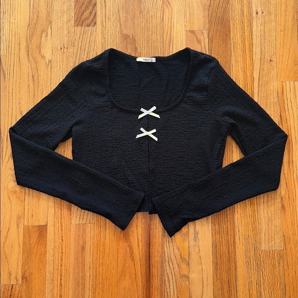 Timing Black Cropped Long-Sleeve Top with White Bow Accents